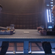 Soji and Picard sit across from each other at a table in a scene from Star Trek series Picard.